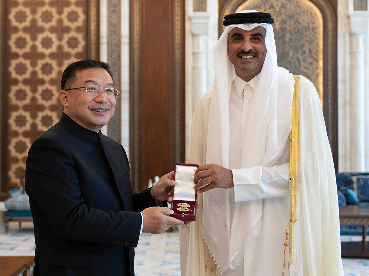 HH the Amir Grants Al Wajbah Decoration to Ambassador of China